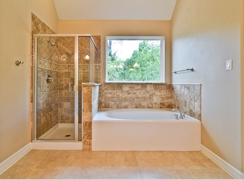 Inspiration for a mid-sized transitional master beige tile, brown tile and ceramic tile travertine floor alcove bathtub remodel in Houston with raised-panel cabinets, white cabinets, a two-piece toilet, beige walls, an undermount sink and granite countertops