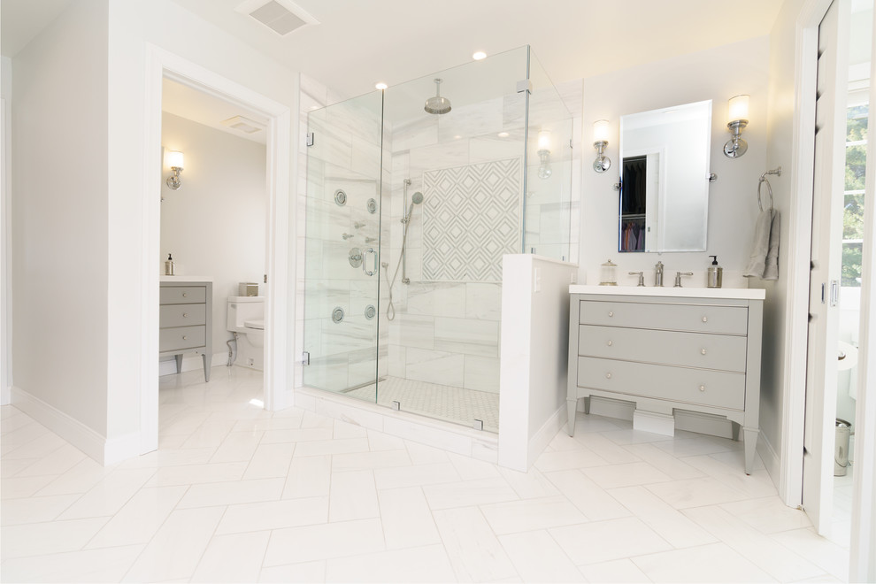 Large contemporary master bathroom in Other with flat-panel cabinets, grey cabinets, a freestanding tub, a double shower, white tile, marble, grey walls, marble floors, an undermount sink, quartzite benchtops, white floor and a hinged shower door.