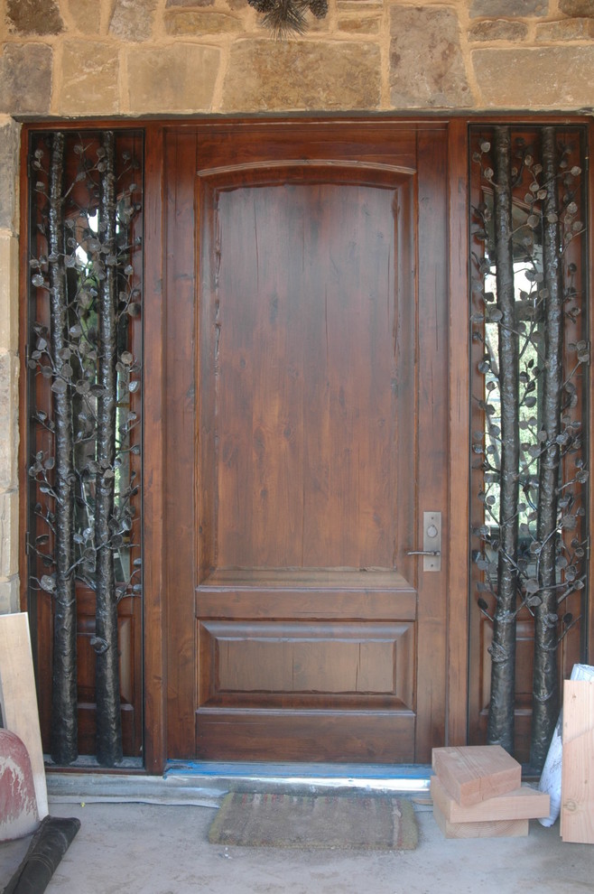 Mountain style entryway photo in Denver