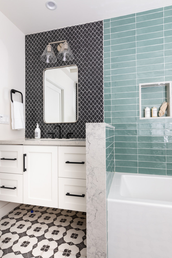 Example of a mid-sized transitional kids' black and white tile and ceramic tile porcelain tile, black floor and double-sink bathroom design in Los Angeles with shaker cabinets, white cabinets, a one-piece toilet, white walls, an undermount sink, quartz countertops, gray countertops and a floating vanity