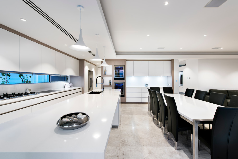 This is an example of a large contemporary galley eat-in kitchen in Perth with flat-panel cabinets, white cabinets and with island.