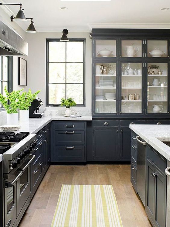 Design ideas for a modern kitchen in Atlanta with shaker cabinets, grey cabinets, marble benchtops, with island, brown floor and white benchtop.