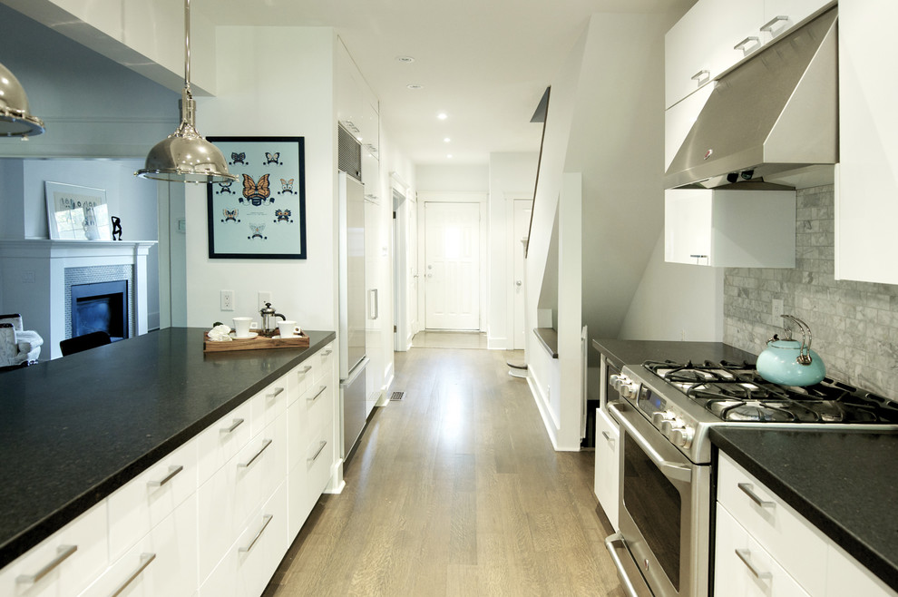 Contemporary kitchen in Toronto with stainless steel appliances.