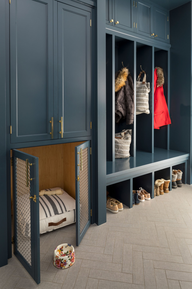 Traditional mudroom in Minneapolis with grey floor.