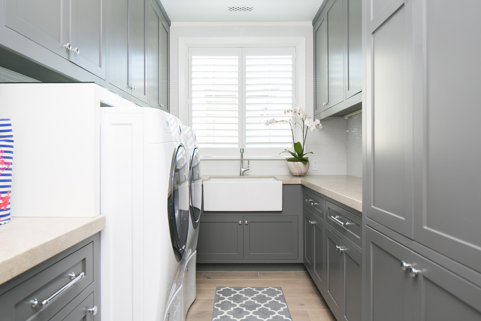 Photo of a transitional laundry room in Orange County.