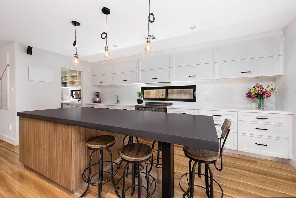 This is an example of a transitional kitchen in Canberra - Queanbeyan.