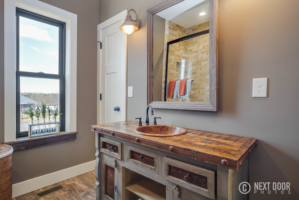 Inspiration for a rustic bathroom remodel in Grand Rapids
