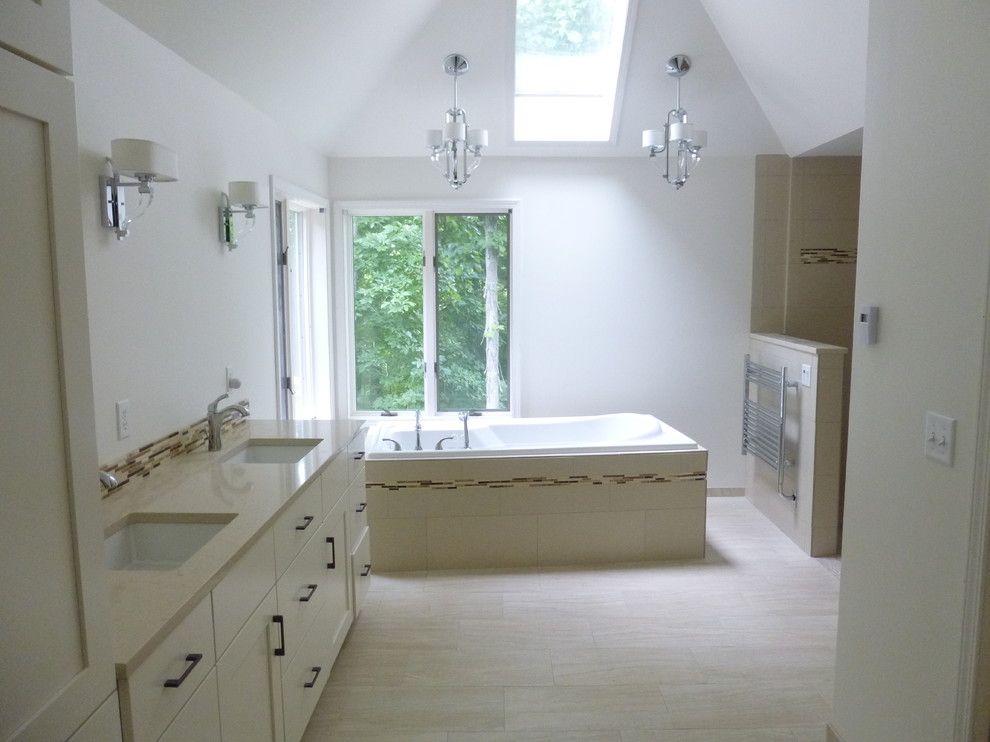 This is an example of a large traditional master bathroom in Chicago with shaker cabinets, white cabinets, a drop-in tub, a corner shower, a two-piece toilet, beige tile, brown tile, matchstick tile, white walls, slate floors, an undermount sink, quartzite benchtops, grey floor and an open shower.