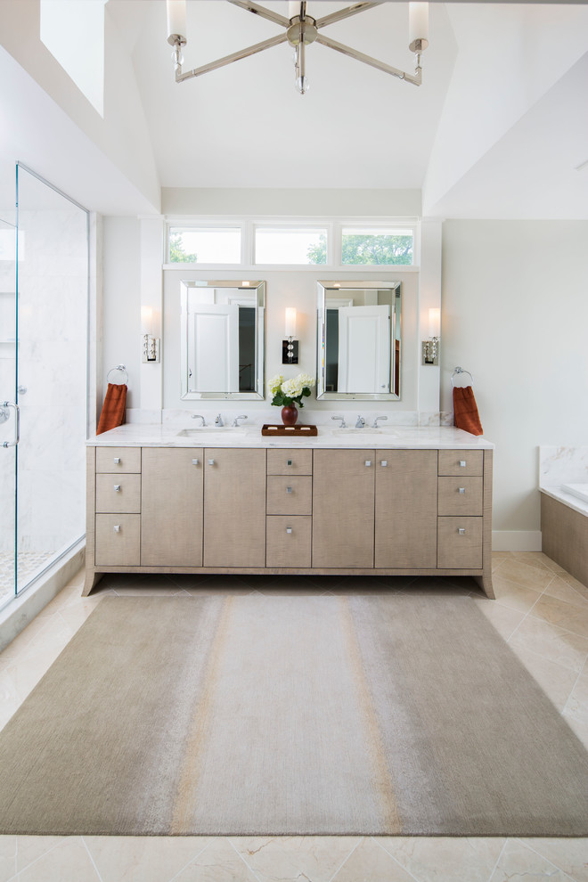 Design ideas for a mid-sized contemporary master bathroom in New York with flat-panel cabinets, marble benchtops, light wood cabinets, white walls, an undermount sink and a hinged shower door.