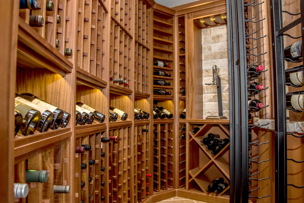 Inspiration for a small mediterranean wine cellar in Denver with storage racks and yellow floor.