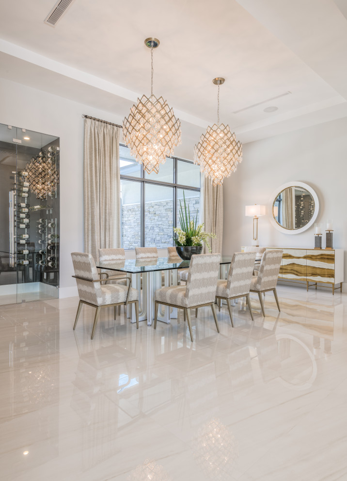 Inspiration for a large transitional open plan dining in Miami with beige walls, marble floors, no fireplace and beige floor.