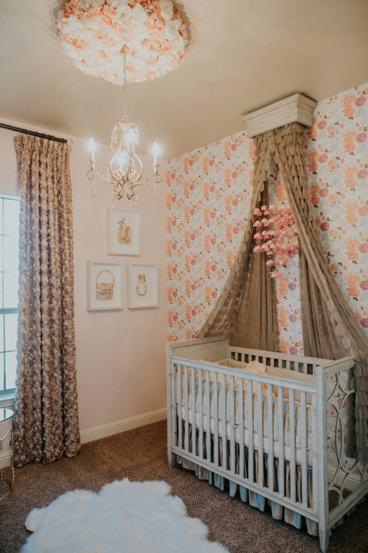 Design ideas for a small transitional nursery in Austin with carpet.