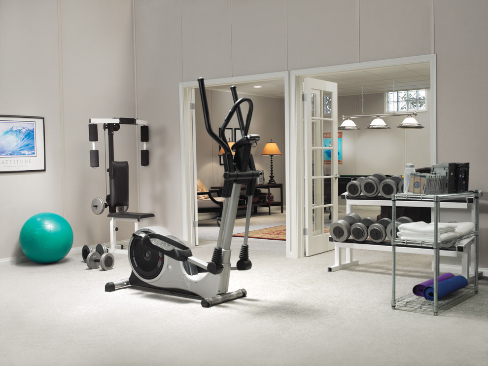 Design ideas for a mid-sized modern home gym in Boston with grey walls, carpet and white floor.