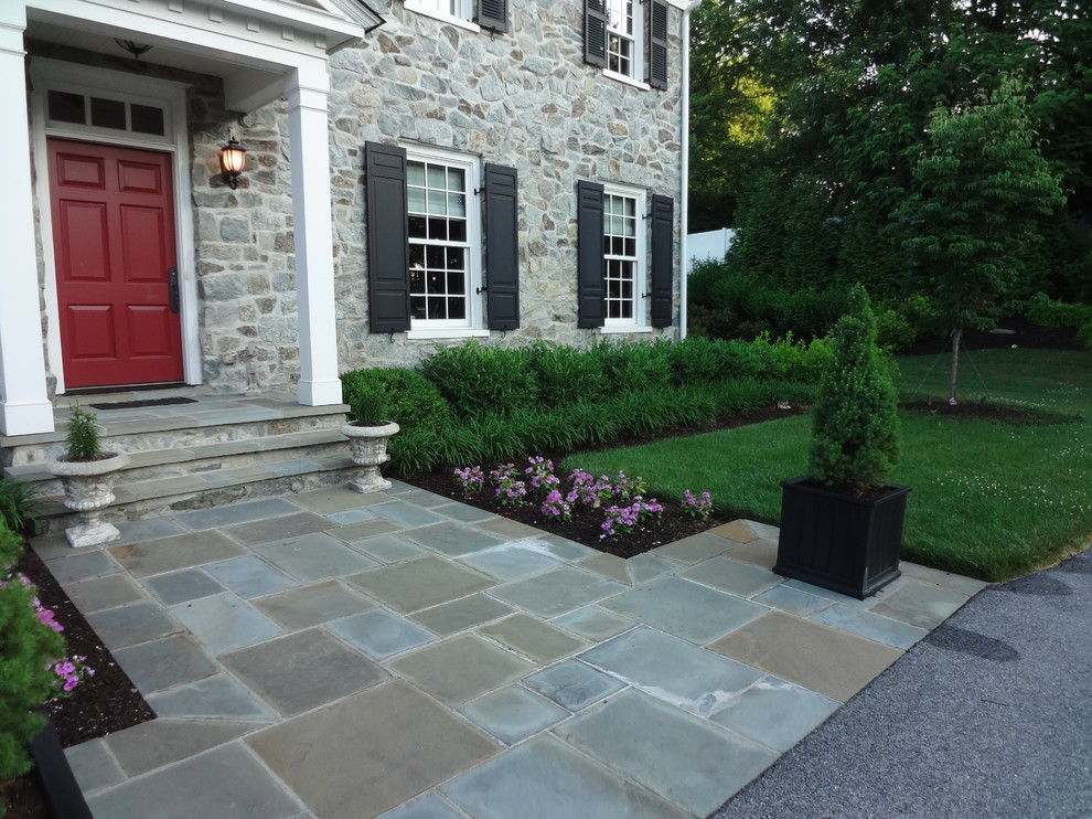 Inspiration for a large transitional slate floor front door remodel in DC Metro with a red front door
