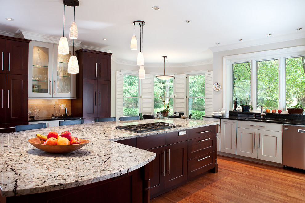 Inspiration for a mid-sized transitional u-shaped light wood floor open concept kitchen remodel in Atlanta with shaker cabinets, white cabinets, beige backsplash, stainless steel appliances and an island