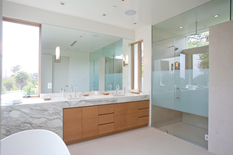 Design ideas for a contemporary bathroom in Los Angeles with a freestanding tub.