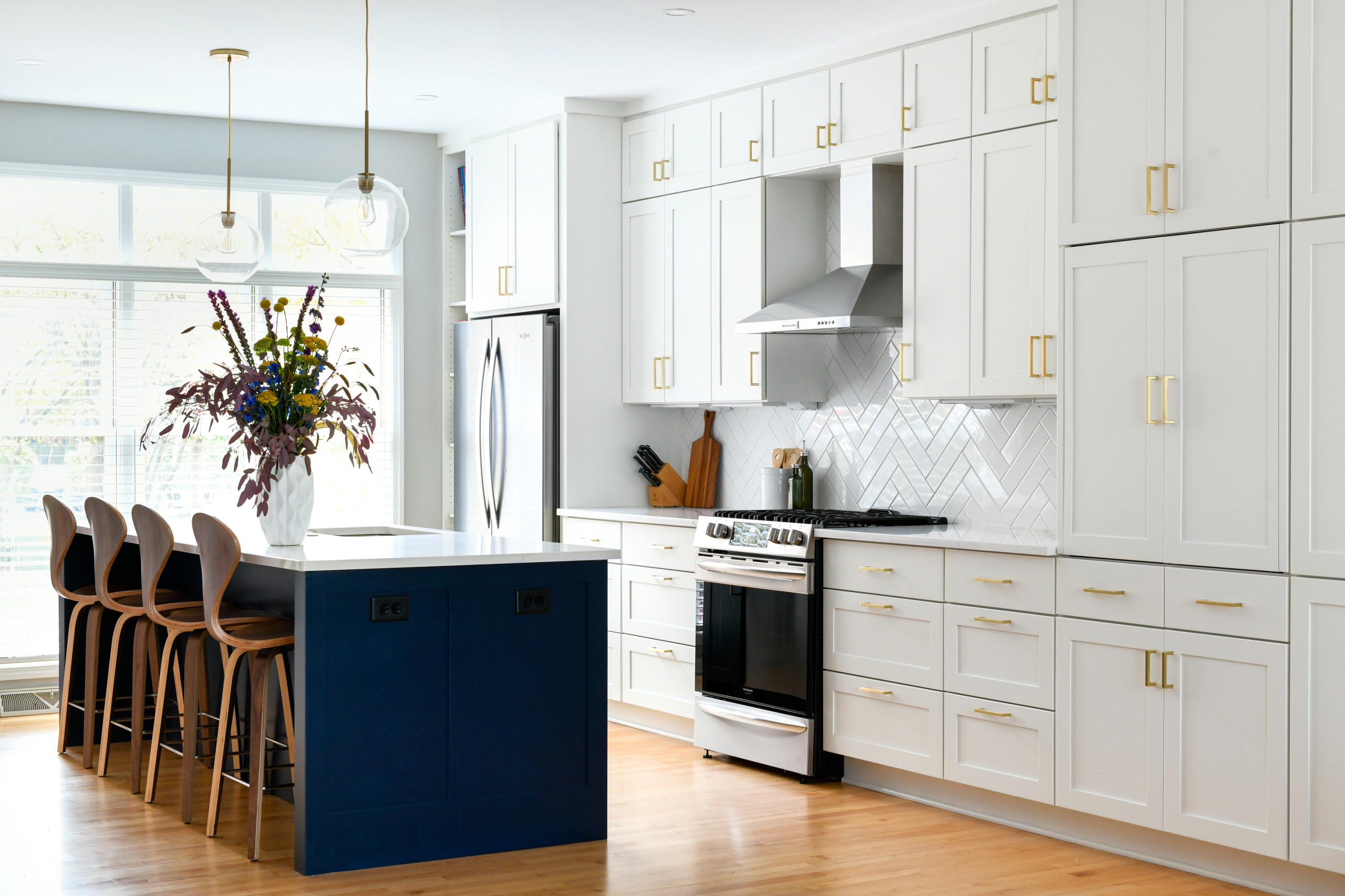 Blue, White and Gold Kitchen and Living Space