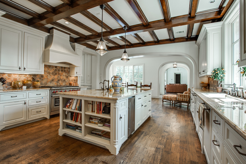 Inspiration for a traditional galley eat-in kitchen in Dallas with a double-bowl sink, recessed-panel cabinets, white cabinets, beige splashback, stainless steel appliances and medium hardwood floors.