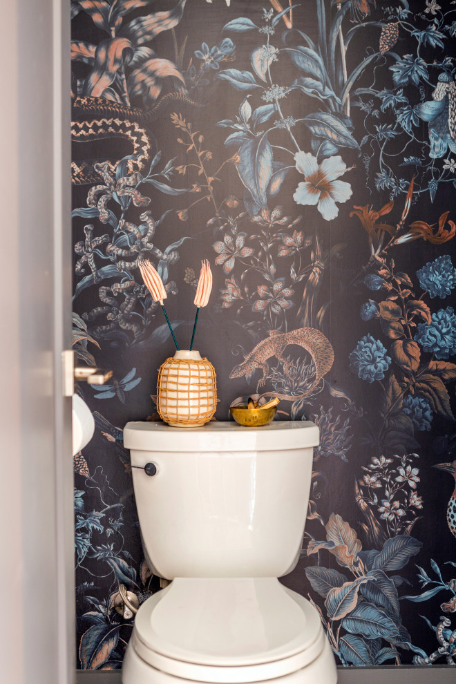 This is an example of a small bohemian cloakroom in Austin with flat-panel cabinets, grey cabinets, a floating vanity unit, a wallpapered ceiling and wallpapered walls.