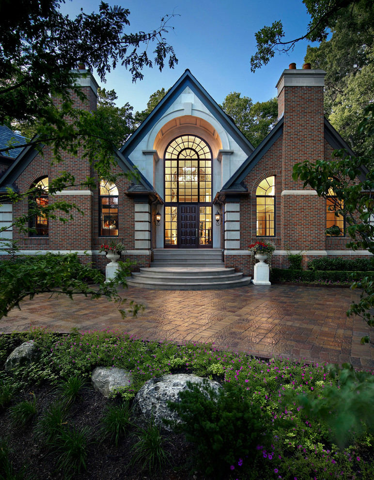 Design ideas for a large transitional house exterior in Detroit.