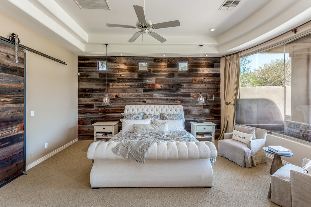 Photo of a master bedroom in Phoenix with beige walls, carpet and beige floor.
