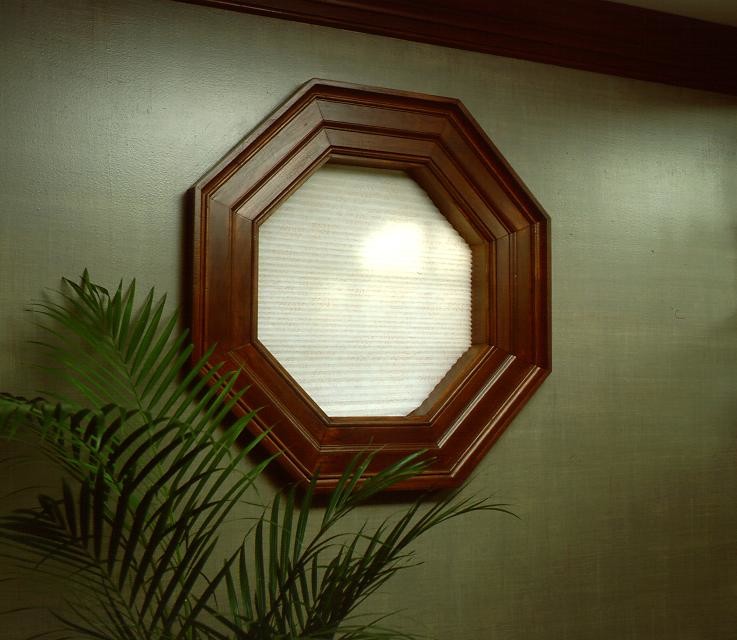 Octagonal interior window with a shade