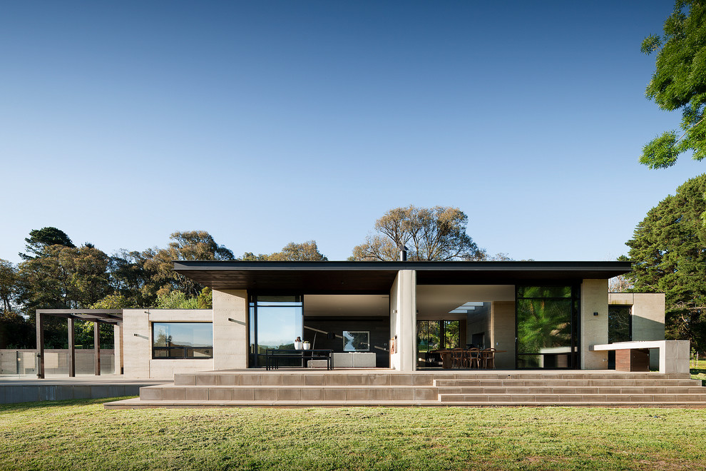 This is an example of a modern exterior in Melbourne with a flat roof.