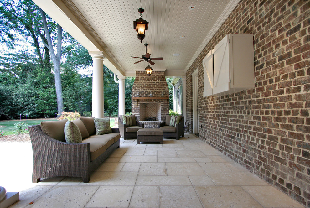 Photo of a traditional verandah in Atlanta with a fire feature.