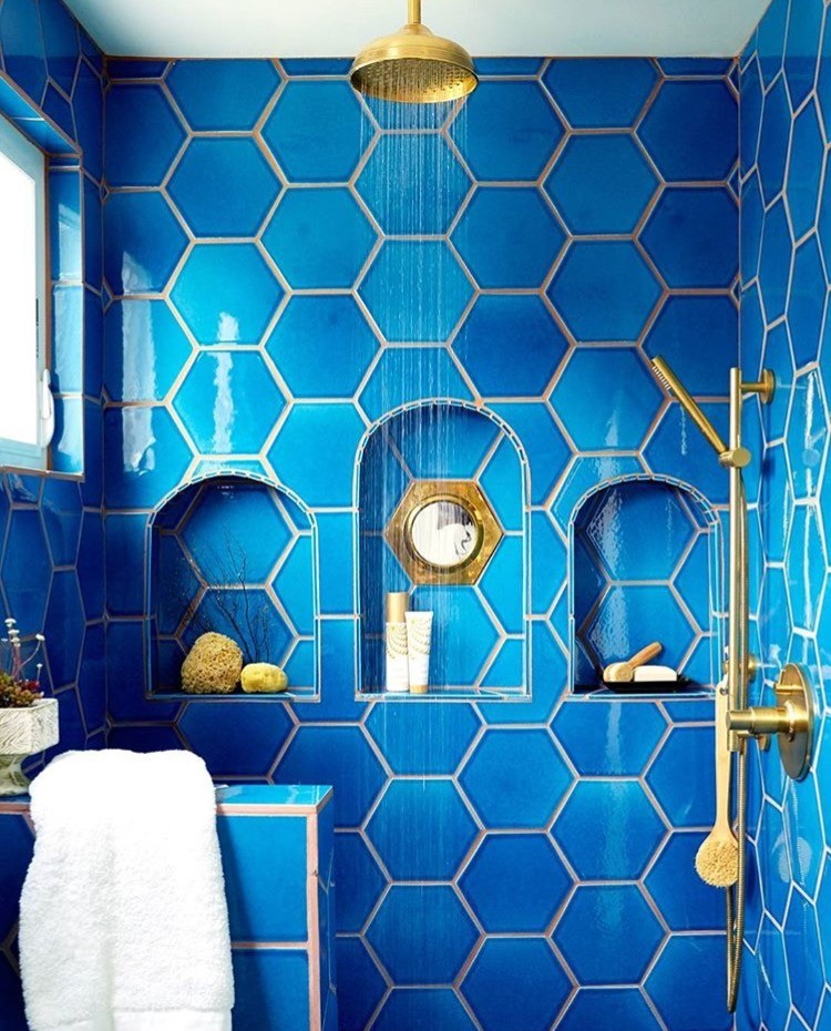 Inspiration for an eclectic master bathroom in Los Angeles with blue tile, ceramic tile, blue walls and ceramic floors.