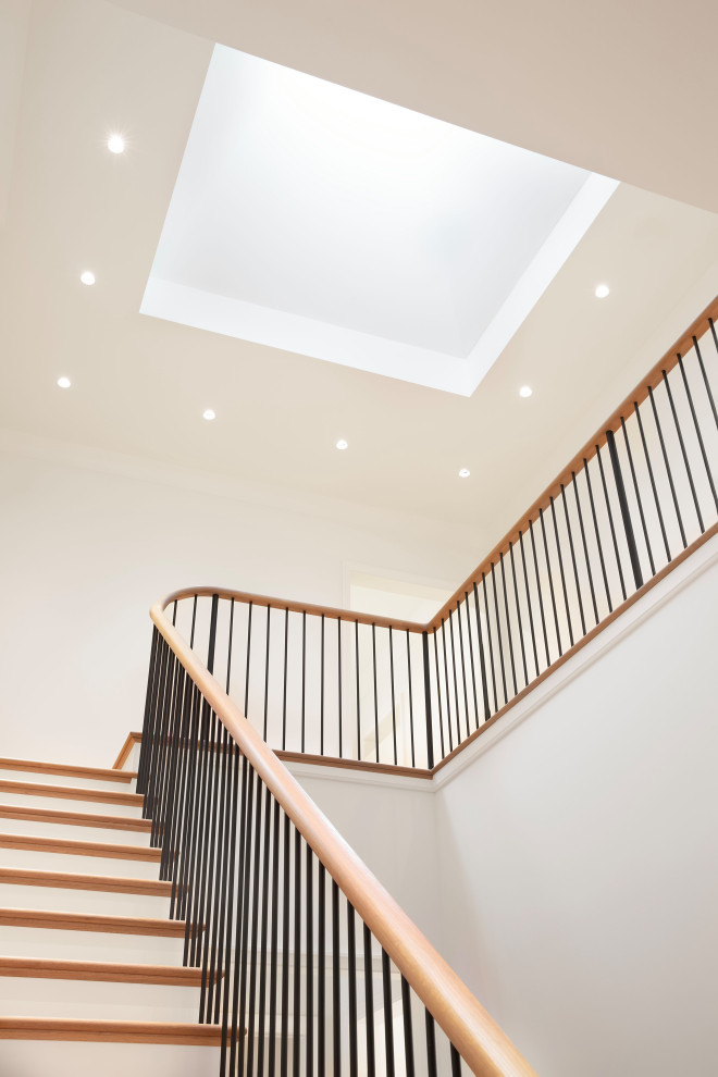 Inspiration for a mid-sized contemporary wooden straight wood railing staircase remodel in Chicago with wooden risers