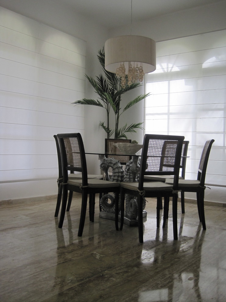 Photo of a tropical dining room in Other.