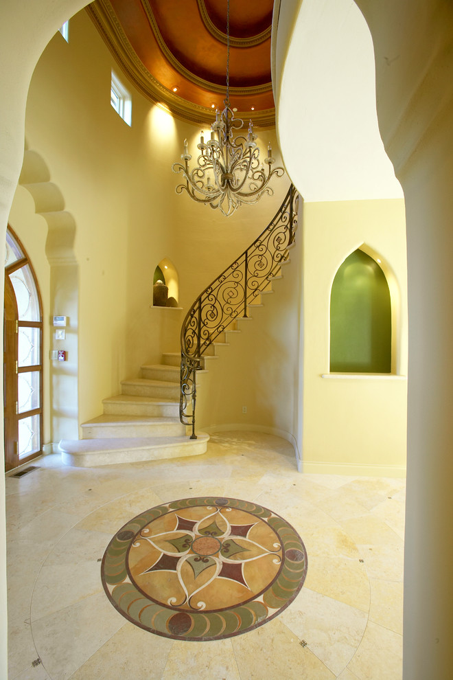 Inspiration for an expansive mediterranean foyer in San Francisco with yellow walls.