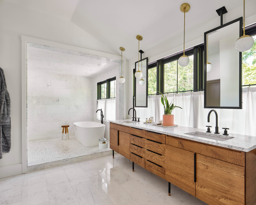 Inspiration for a contemporary master wet room bathroom in Philadelphia with flat-panel cabinets, medium wood cabinets, a freestanding tub, marble, white walls, marble floors, an undermount sink, multi-coloured floor, an open shower and grey benchtops.