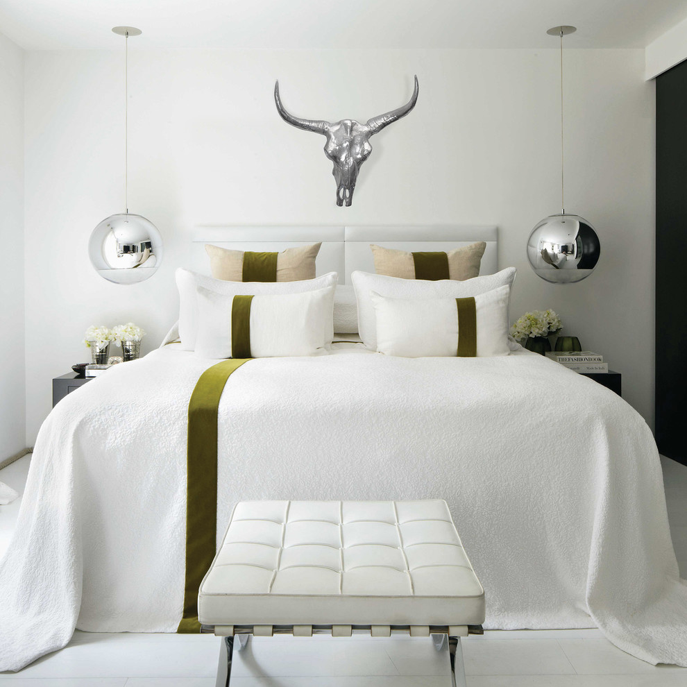 Design ideas for a contemporary bedroom in Montreal with white walls and white floor.