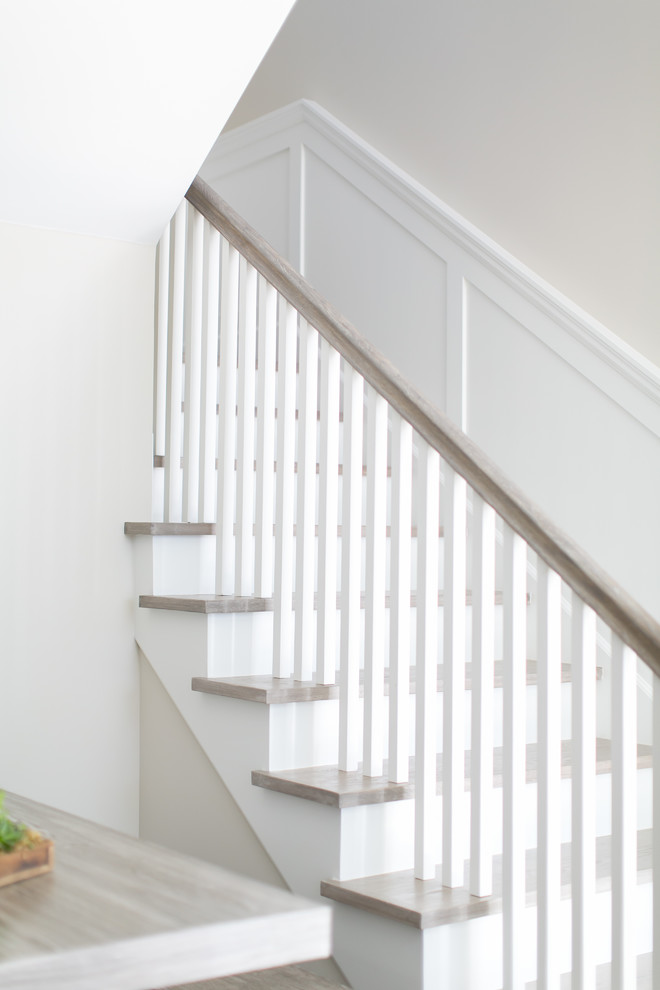 Example of a transitional staircase design in Orange County
