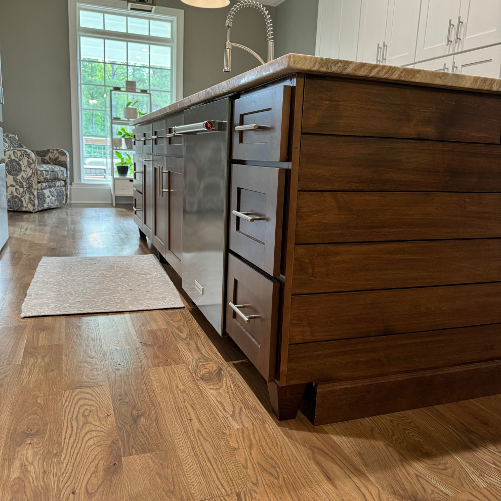 Eat-in kitchen - transitional galley medium tone wood floor and brown floor eat-in kitchen idea in Atlanta with an undermount sink, shaker cabinets, white cabinets, granite countertops, gray backsplash, ceramic backsplash, stainless steel appliances, an island and multicolored countertops