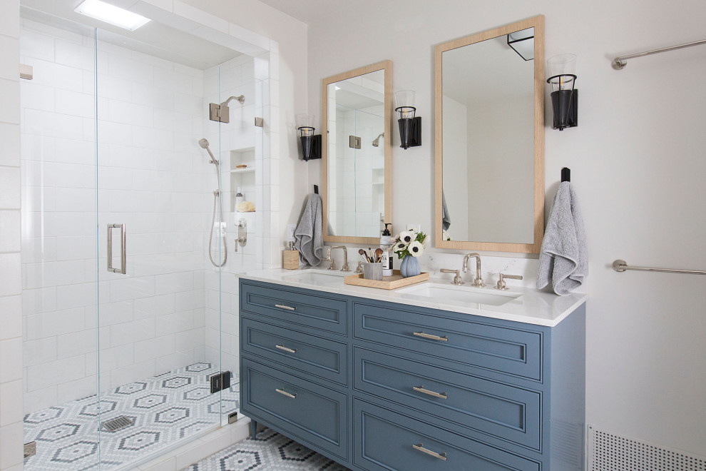 Inspiration for a large transitional master bathroom in San Francisco with blue cabinets, an alcove shower, white tile, subway tile, mosaic tile floors, an undermount sink, engineered quartz benchtops, multi-coloured floor, a hinged shower door, white benchtops, a double vanity, a freestanding vanity and beaded inset cabinets.