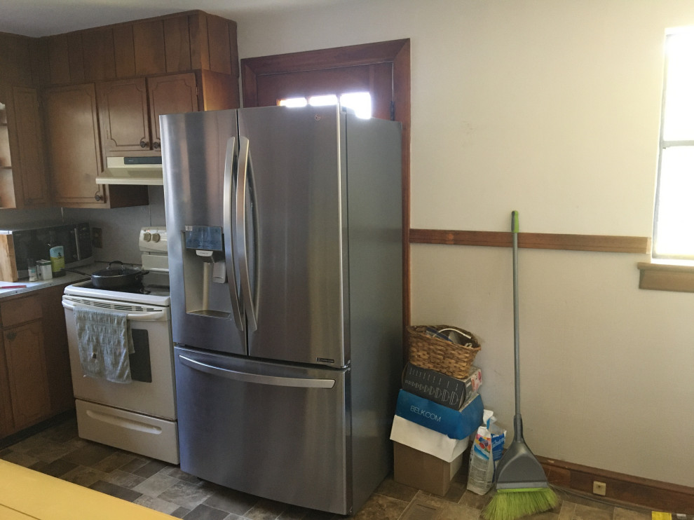 Refrigerator too far from rest of kitchen, on top?