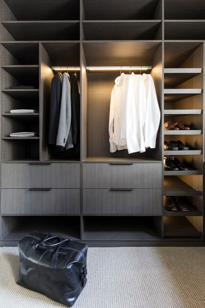 Photo of a mid-sized contemporary storage and wardrobe in Sydney.