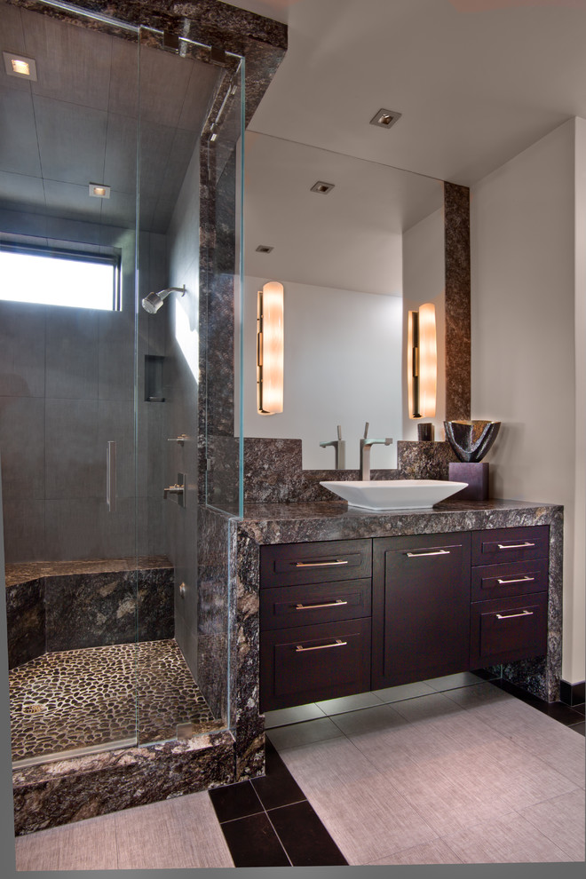 Photo of a contemporary bathroom in San Diego with a vessel sink, brown floor and brown benchtops.