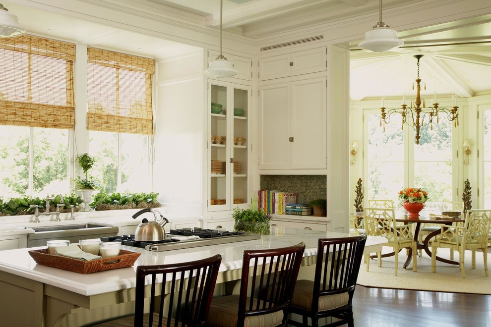 Ornate kitchen photo in New York with a farmhouse sink, recessed-panel cabinets and beige cabinets