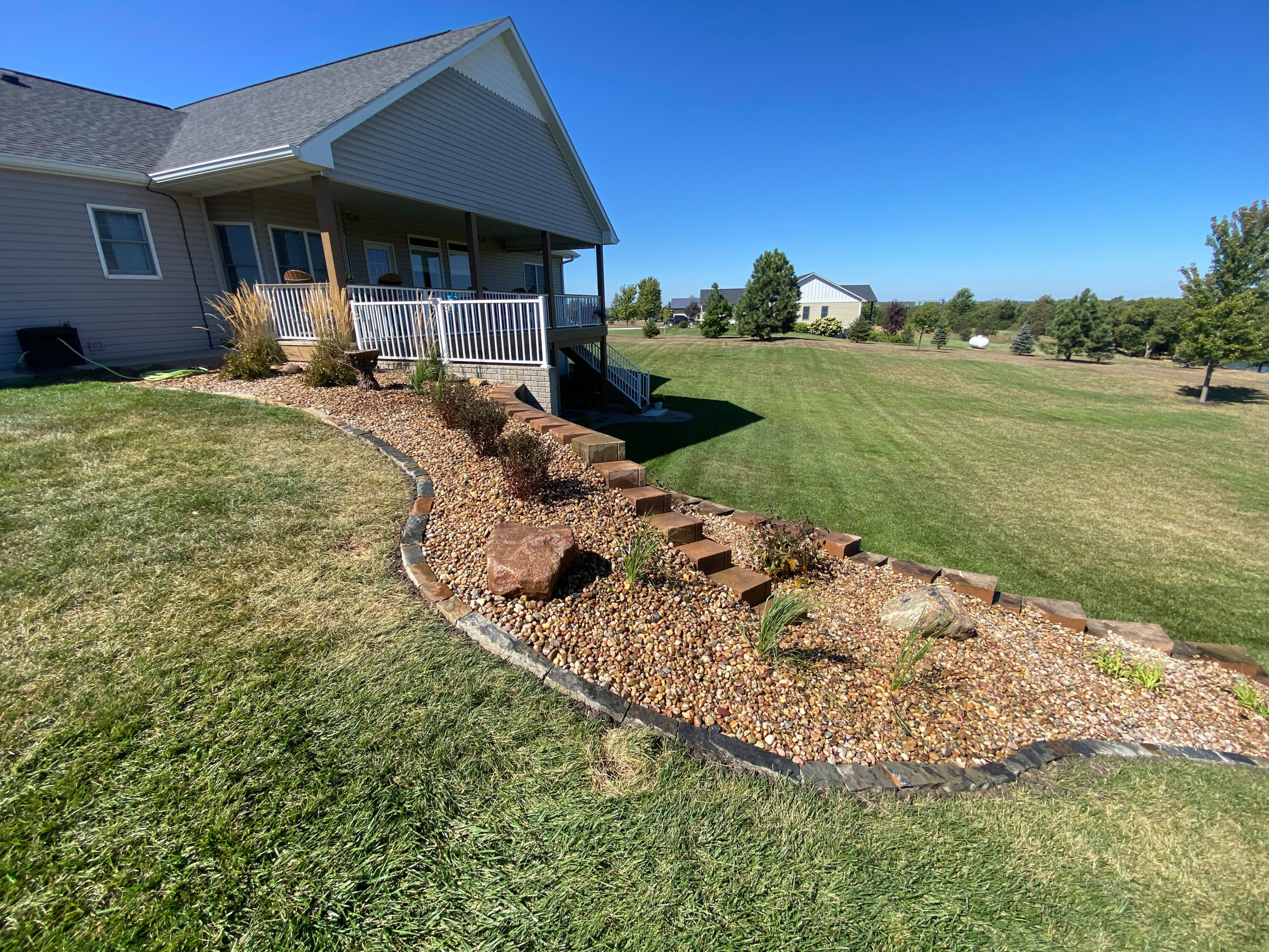 Upper Wall Rebuild & Softscaping