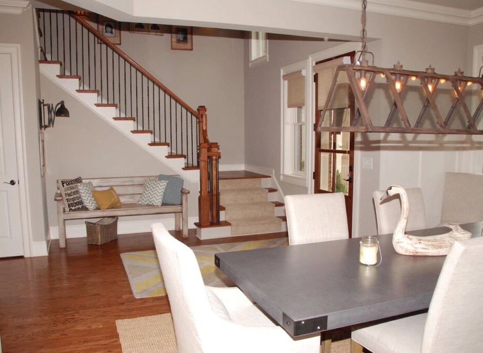 Photo of a mid-sized country separate dining room in Atlanta with grey walls and medium hardwood floors.