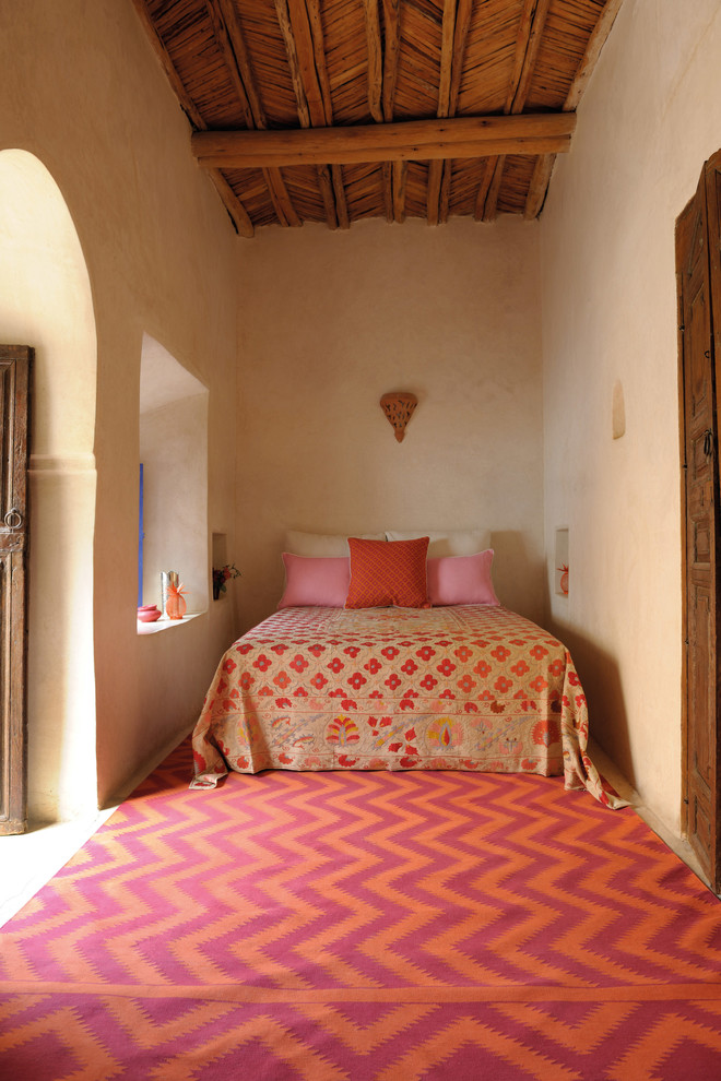 Photo of a mediterranean bedroom in London.