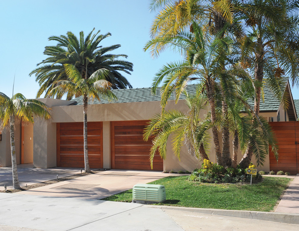 Inspiration for a contemporary stucco exterior in San Diego.