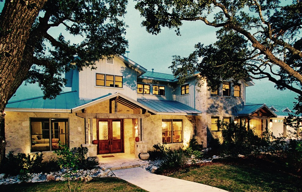 Photo of an expansive arts and crafts two-storey exterior in Austin.