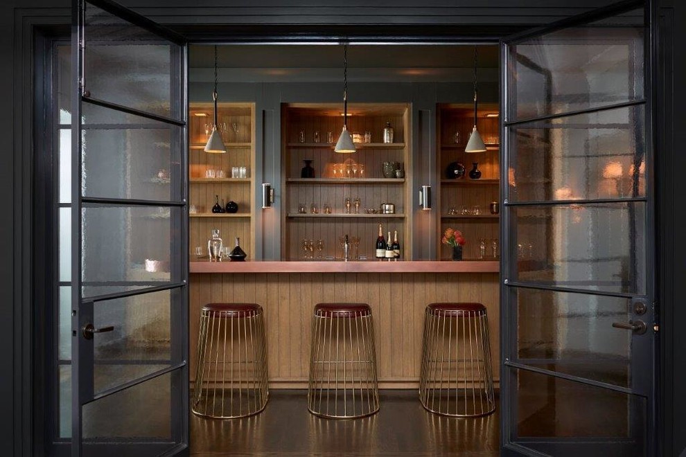 Photo of a transitional galley home bar in Los Angeles with open cabinets, medium wood cabinets, brown splashback, timber splashback and brown benchtop.