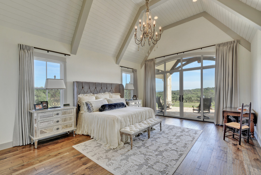Photo of a country bedroom in Austin.