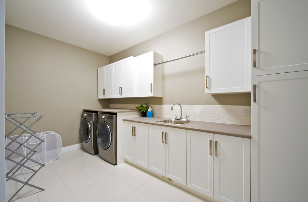 Inspiration for a transitional laundry room in Vancouver.