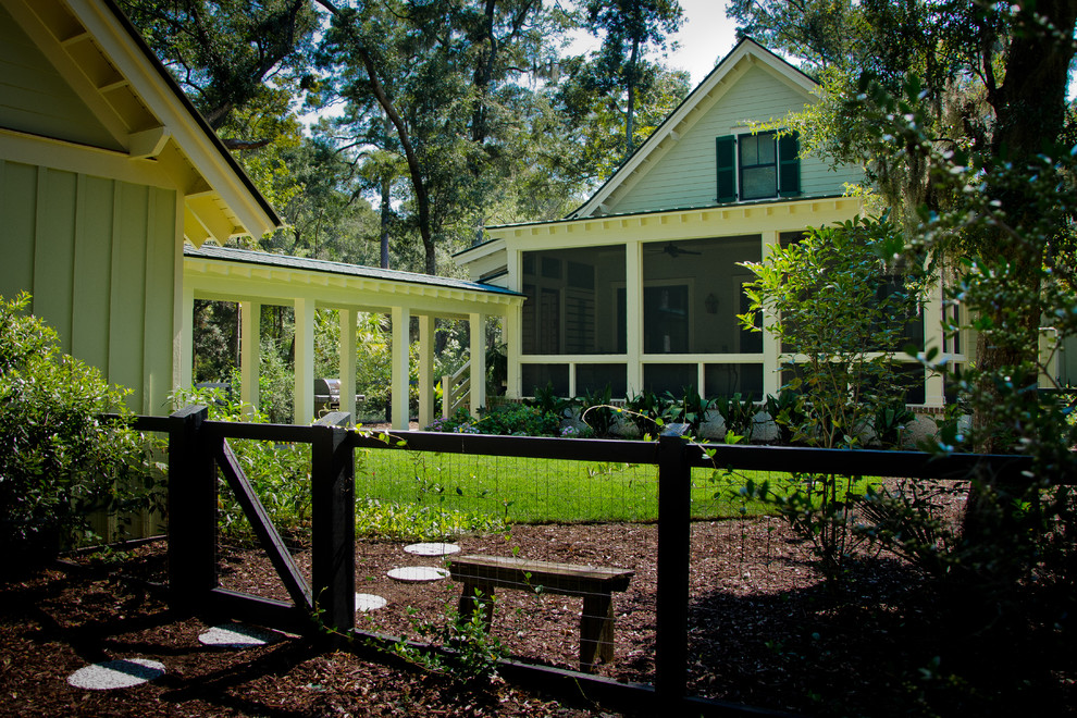 Country exterior in Charleston with wood siding.
